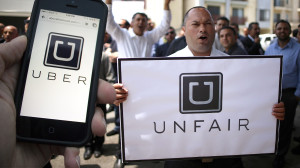 Uber drivers protest against working conditions outside the company's office in Santa Monica